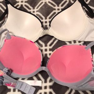 2 Bras one is from Pink, The other is from Belks